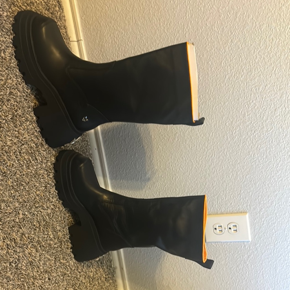 Naked Wolfe Black and Orange Winter Rain Boots Sleek Design